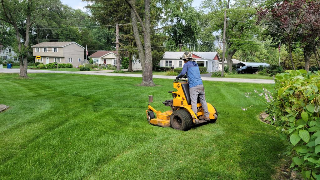 man mowing lawn