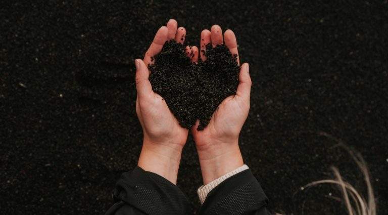 black-soil-formed-into-a-shape-of-a-heart-16047143