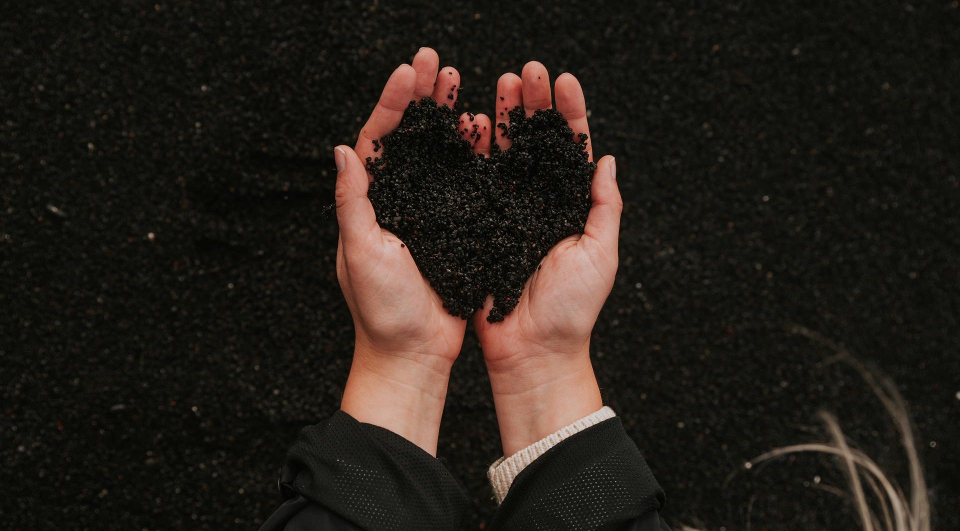 black-soil-formed-into-a-shape-of-a-heart-16047143